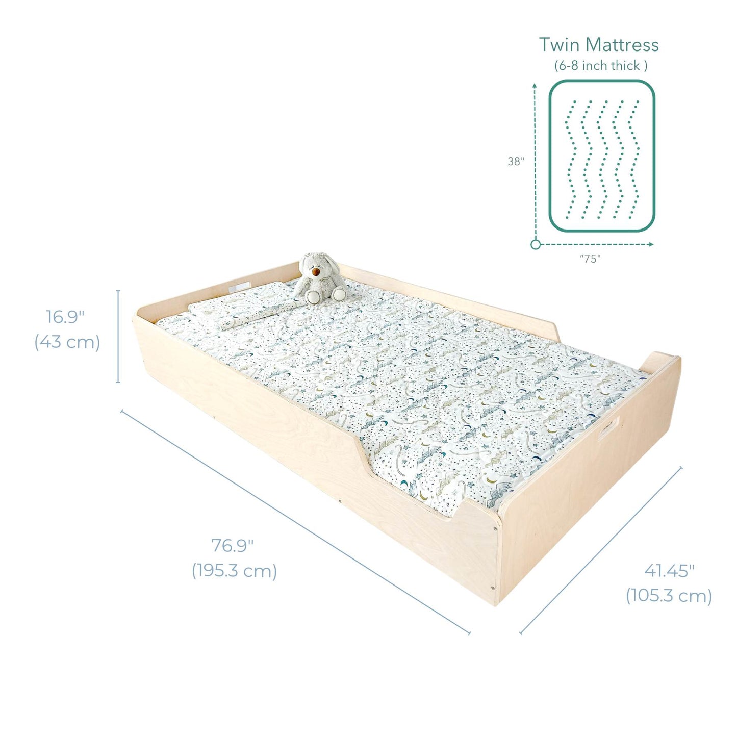 Spacious enclosed floor bed designed for toddlers and young kids, shown with labeled dimensions: 76.9" (195.3 cm) long, 41.45" (105.3 cm) wide, and 16.9" (43 cm) high. Fits a twin mattress (6-8 inches thick) for long-term use. The breathable, low-profile design supports independent sleep, with raised sides for security. Dressed in celestial-patterned bedding with a plush bunny for a cozy touch.