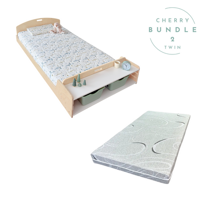 Montessori floor bed for kids aged 1 to 10, made from birch plywood with rounded edges. The bundle includes a twin-size memory foam mattress and integrated storage shelves at the foot of the bed, styled with playful toys and minimal décor.